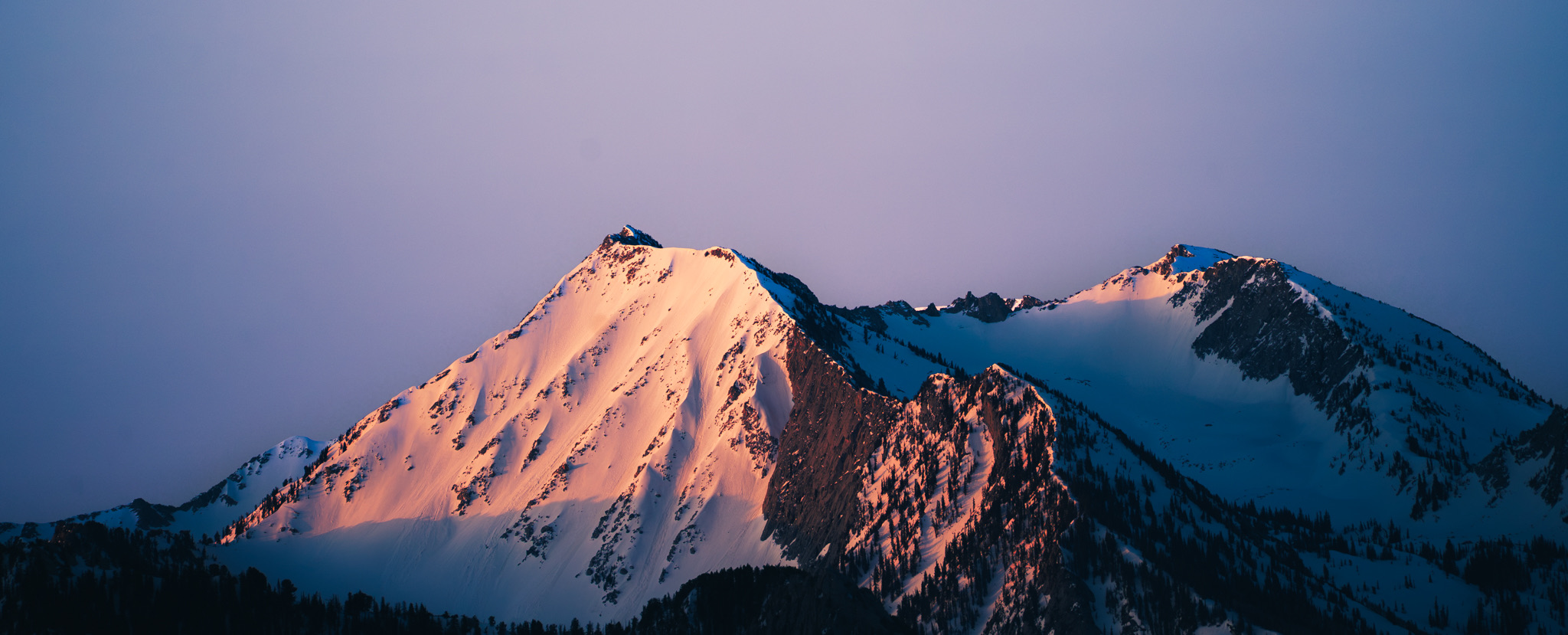 Alpenglow on a snow-capped peak
